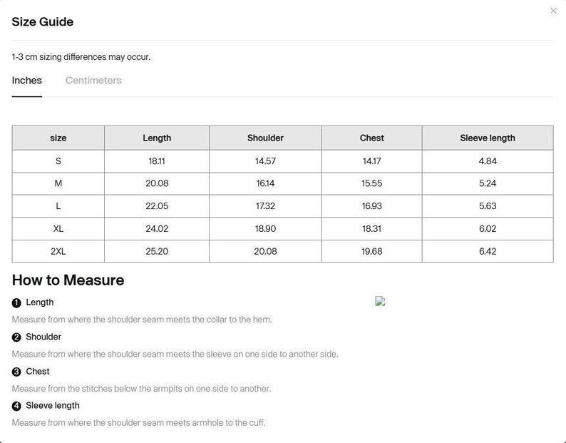 May include: A size guide table with measurements in inches for length, shoulder, chest, and sleeve length. Sizes range from S to 2XL. Instructions on how to measure length, shoulder, chest, and sleeve length are also included.