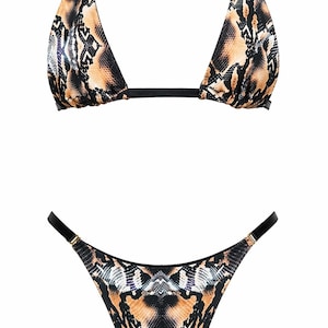 May include: A two-piece bikini set featuring a brown, black, and white snakeskin print. The top is a triangle style with black straps and gold-tone hardware. The bottom is a high-cut style with matching black straps and gold-tone hardware connectors.