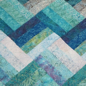 PDF Pattern Ocean Rail Fence Waves twin and queen sized quilt is easy and fun, made from medium, dark, and light batiks in green blue purple image 2