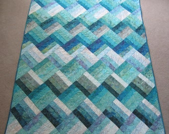 PDF Pattern Ocean Rail Fence Waves twin and queen sized quilt is easy and fun, made from medium, dark, and light batiks in green blue purple