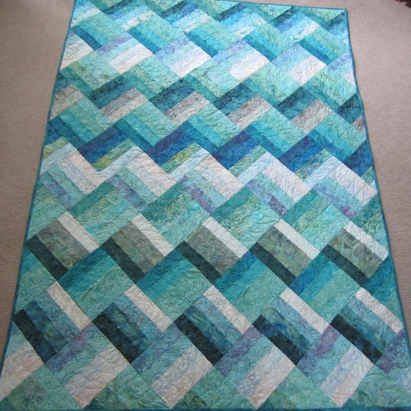 PDF Pattern Ocean Rail Fence Waves twin and queen sized quilt is easy and fun, made from medium, dark, and light batiks in green blue purple