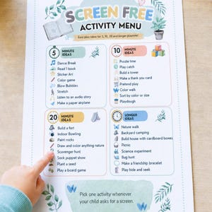 May include: A white paper sheet titled Screen Free Activity Menu with colorful illustrations and text listing play ideas categorized by time duration including 5, 10, 20 minute and longer options, decorated with watercolor leaves and a small heart.