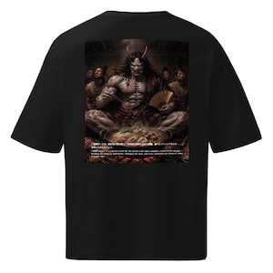 May include: Black t-shirt featuring a detailed illustration of a horned demon seated before a pot of food, holding chopsticks and a fan. The image includes Japanese text at the bottom. The design is centered on the shirt's back.