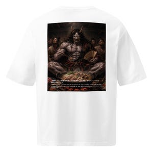 May include: White t-shirt featuring a detailed illustration of a horned demon seated before a pot of food, surrounded by figures. The artwork includes text in Japanese. A fan is held in one hand, chopsticks in the other.