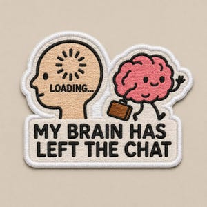 May include: An embroidered patch featuring a beige human head silhouette with a black loading icon and the text LOADING... next to a pink cartoon brain carrying a brown briefcase. Below, the text reads MY BRAIN HAS LEFT THE CHAT.