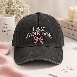 I Am Jane Doe Washed Cap, Pink Bow Embroidered Baseball Hat, Vintage Black Dad Hat for Women, Coquette Bow Statement Cap