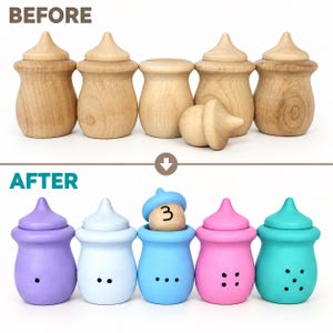 Pu&ograve; includere: Un set di cinque contenitori in legno a forma di ghianda, mostrati prima e dopo la verniciatura. La fila superiore mostra una finitura in legno naturale, mentre quella inferiore presenta colori viola, azzurro, blu, rosa e verde acqua con puntini.