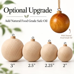 May include: Four round wooden ornaments with metal eyelets, sized 3, 2.5, 2.25, and 2 inches. Text reads Optional Upgrade Add Natural Food Grade Safe Oil. A separate oiled wooden ornament is shown above with the text With Natural Food Grade Oil.
