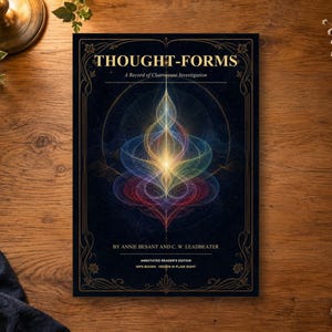 Puede incluir: Un libro titulado Thought-Forms: A Record of Clairvoyant Investigation por Annie Besant y C. W. Leadbeater. La portada presenta un fondo azul oscuro con bordes dorados ornamentados y un patrón de luz abstracto central, brillante y multicolor.