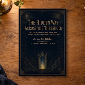 May include: A hardcover book titled The Hidden Way Across the Threshold by J. C. Street, Annotated Reader's Edition. The dark blue cover features gold text and an illustration of a glowing arched doorway at the bottom center with ornate borders.