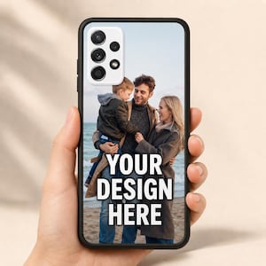 May include: A black smartphone case featuring a customizable photo print of a family standing on a beach. The image displays a child, a person in a dark sweater, and a person in a long coat. The text YOUR DESIGN HERE is printed in white.