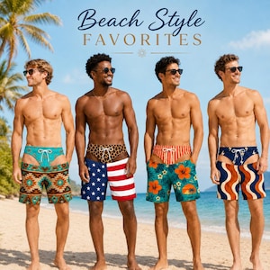 May include: Four pairs of swim trunks featuring distinct patterns: a turquoise geometric print, an American flag design, a green tropical floral print, and a navy blue wavy pattern with lightning bolts, all with white drawstring waistbands.