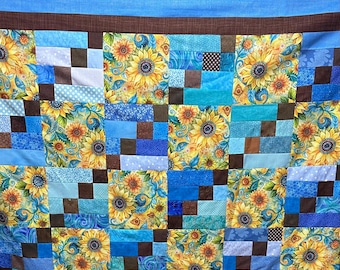 Sunflowers by the Seaside large throw size quilt.