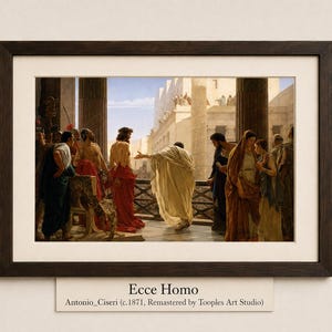 May include: A framed art print of Antonio Ciseri's Ecce Homo, circa 1871, depicting a historical scene with figures in robes on a balcony. The print features a dark wood frame and a cream mat, with the text Ecce Homo and artist details below.
