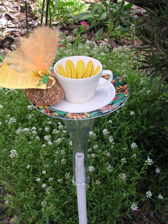 Items similar to Teacup birdfeeder, upcycled teacup, garden stake