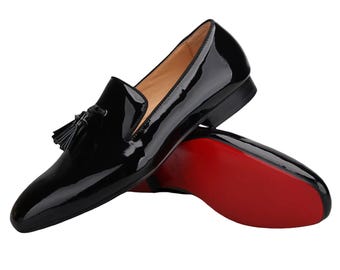 Mocassini da uomo Christian Louboutin in pelle verniciata nera con nappine