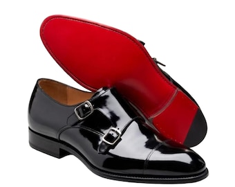 Scarpe con doppia fibbia in pelle verniciata nera