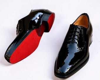 Ballerine da uomo Christian Louboutin in pelle verniciata nera con suola rossa