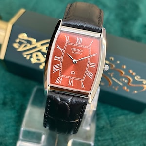 Vintage Seiko Copper Red Tonneau Watch Silver Case Black Leather Strap Quartz Dress Watch