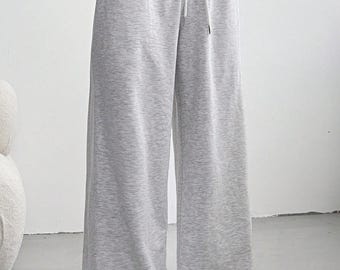Lichtgrijze joggingbroek met wijde pijpen, lage taille en trekkoord (polyester mix)