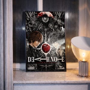 May include: A rectangular Death Note poster featuring anime characters Light Yagami and L, with the shinigami Ryuk above them. A bright red apple sits in the centre. The title Death Note is printed in white text at the bottom of the poster.