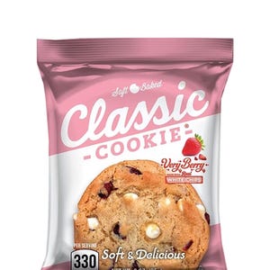 May include: A pink and white package of "Classic Cookie" with a "Very Berry" flavor. The cookie is visible through the clear front of the package, showing white chocolate chips and red berries. The package states "Soft & Delicious" and the net weight is 3 oz.