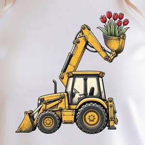 May include: A white t-shirt featuring a graphic illustration of a yellow construction excavator. The excavator's front bucket is raised and holds a cluster of red tulips with green stems and leaves. The vehicle has black tires and windows.