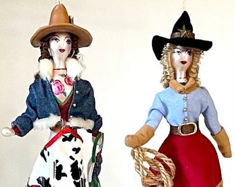 Pair of vintage Italian figural blown glass cowgirl ornaments, De Carlini style