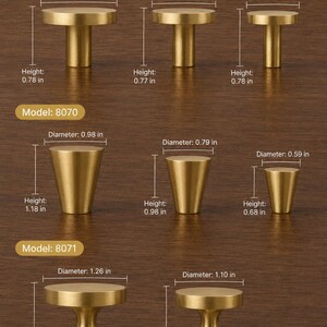 May include: A collection of brass-toned metal cabinet knobs arranged in three rows labeled Model 8069, 8070, and 8071. The knobs feature various cylindrical, tapered, and flared shapes with printed dimensions in inches for diameter and height.