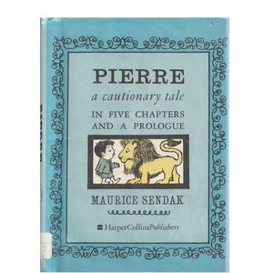 May include: A vintage book titled "PIERRE a cautionary tale" by Maurice Sendak. The cover is light blue with a decorative border and features an illustration of a boy and a lion. Published by HarperCollins Publishers.