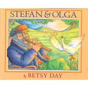 May include: A book cover illustration depicting a man playing a flute, with a goose in the background. The title "STEFAN & OLGA" is displayed above the illustration, with the author's name, "by BETSY DAY", below. The artwork has a warm, inviting colour palette.