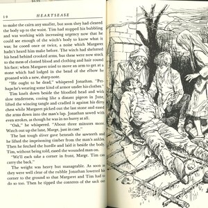 May include: An illustration from a book depicts a wounded person lying on a makeshift stretcher, surrounded by concerned onlookers. The black and white drawing has a vintage feel, with detailed shading and a dramatic composition.