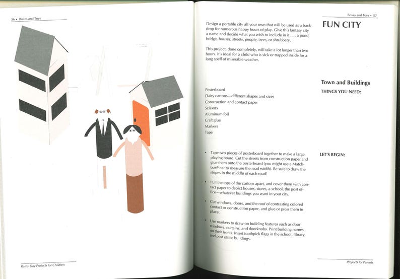 May include: An open book page with illustrations of paper houses and figures. The houses have gray roofs, black windows, and orange doors. The figures are made of paper tubes with simple facial features and clothing. Text on the right side reads "FUN CITY" and "Town and Buildings".