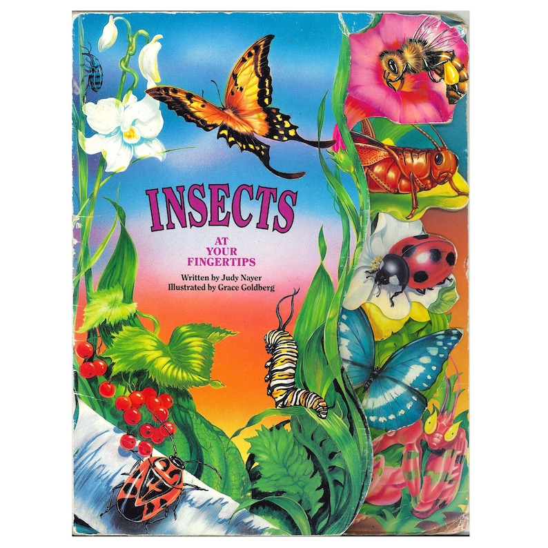 May include: A children's book titled Insects At Your Fingertips, written by Judy Nayer and illustrated by Grace Goldberg. The cover features colorful illustrations of a monarch butterfly, a bee, a grasshopper, a ladybug, a caterpillar, and a beetle.
