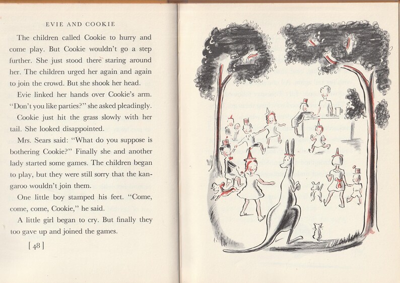May include: A black and white illustration of children playing in a park with a kangaroo. The children are wearing hats and are playing games. The kangaroo is standing in the middle of the picture. The text "Evie and Cookie" is at the top of the page.