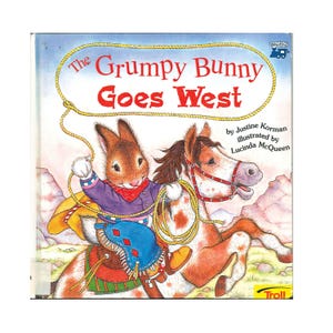 May include: A set of three ceramic mugs with a speckled, matte finish. The mugs are in shades of cream, light gray, and dark gray. Each mug has a simple, minimalist design, perfect for coffee or tea.