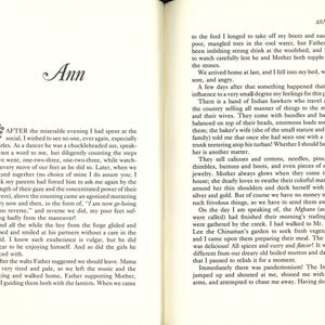 May include: Open book with text. The left page features the title "Ann" in elegant script and a passage beginning "AFTER the miserable evening I had spent at the social...". The right page continues the text, with the page number "45" at the top.