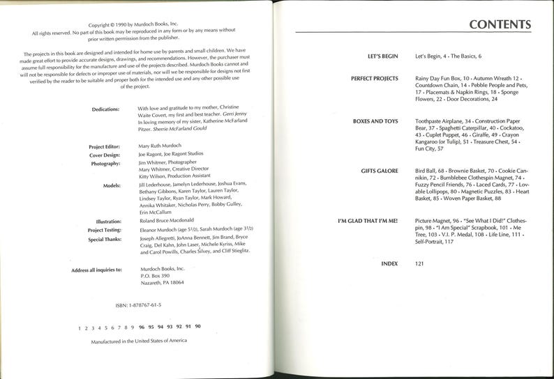 May include: Open book with text on the left and right pages. The left page includes copyright information, dedications, and credits. The right page lists the table of contents, including project names like "Autumn Wreath" and "Cookie Canmikin."