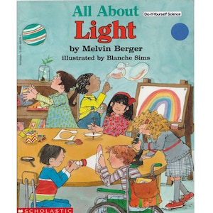 May include: A children's book cover titled "All About Light" with a blue background and a colorful illustration of children in a classroom setting. The book is part of a series called "Do-It-Yourself Science".