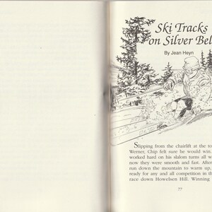 May include: An open book with a black and white illustration of a skier on a snowy slope. The text "Ski Tracks on Silver Bell" and "By Jean Heyn" are at the top. The page number "77" is at the bottom.