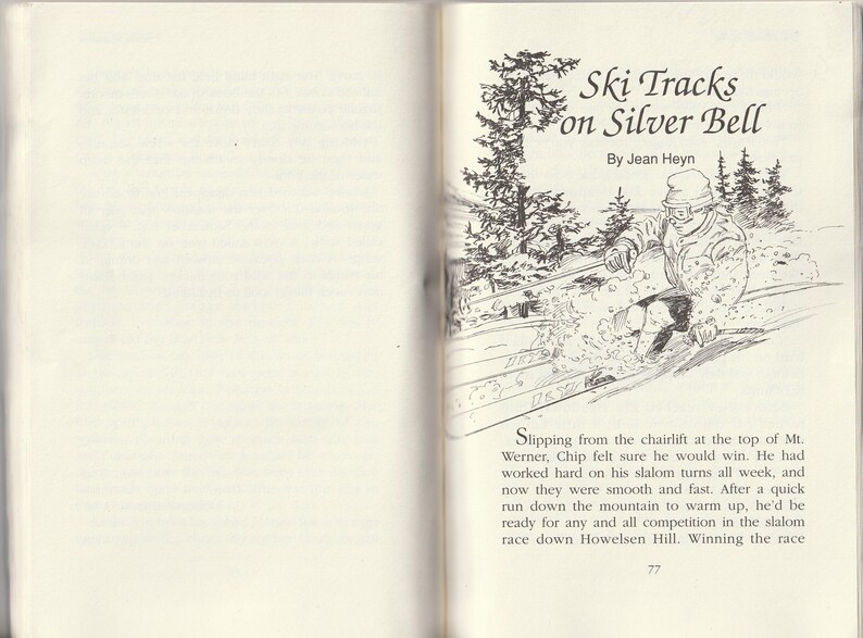 May include: An open book with a black and white illustration of a skier on a snowy slope. The text "Ski Tracks on Silver Bell" and "By Jean Heyn" are at the top. The page number "77" is at the bottom.