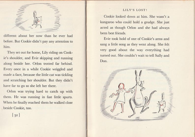 May include: A black and white illustration of a kangaroo, a cat, and a girl. The kangaroo is standing on its hind legs and holding a small cat in its arms. The girl is wearing a red dress and is holding a small cat in her arms. The text "LILY'S LOST!" is written at the top of the page.
