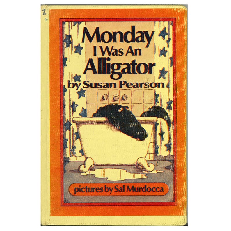 May include: A hardcover book titled Monday I Was An Alligator by Susan Pearson with pictures by Sal Murdocca. The cover features an illustration of a dark green alligator in a white claw-foot bathtub against a yellow curtain with blue stars.