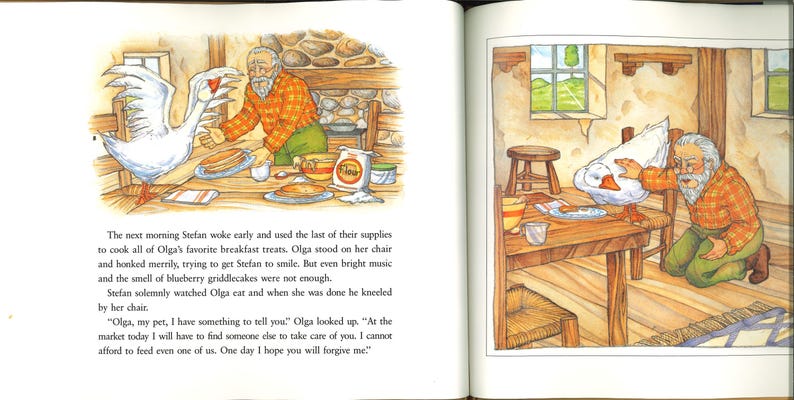 May include: A children's book illustration shows a man and a goose in a kitchen. The man, in an orange plaid shirt, kneels beside the goose. Pancakes and flour are on the table. The scene has a rustic feel.