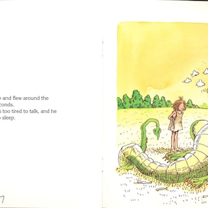 May include: A book page spread featuring text on the left and a watercolor illustration on the right. The text reads: So the dragon jumped up and flew around the whole world in just twenty seconds. When he got back he was too tired to talk, and he lay down and went straight to sleep. The illustration shows a green dragon with a red spine lying on the ground next to a small child wearing a crown.
