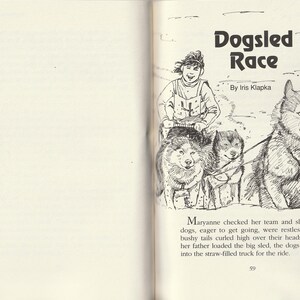 May include: Black and white illustration from a children's book titled "Dogsled Race" by Iris Klapka. The image shows a young person on a sled pulled by three dogs. Text on the page describes the scene.