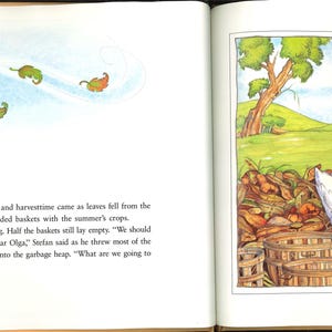 May include: A colourful illustration from a children's book shows a farmer in a checked shirt and hat, examining a harvest with a goose. Baskets of vegetables are in the foreground. Leaves blow on the opposite page.