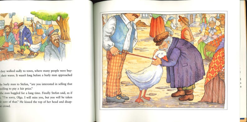 May include: A vibrant illustration from a children's book shows a market scene. Two men are interacting with a white goose, while other figures browse stalls. The artwork features detailed clothing and a rustic setting, creating a storybook atmosphere.
