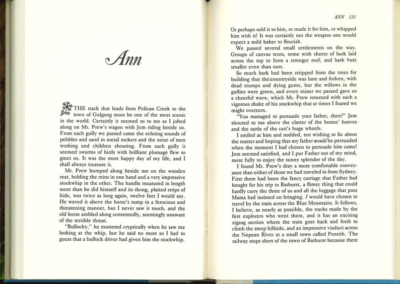 May include: Open book with text on aged paper. The word "Ann" is at the top of the left page. The text describes a journey with a stockwhip, with the handle measuring twelve feet. The right page has text as well.