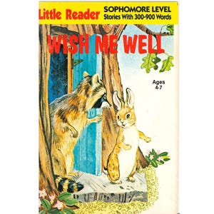 May include: A vintage children's book cover titled "Wish Me Well." The cover features a raccoon and a rabbit standing near a blue door. The book is labeled "Little Reader" and "Sophomore Level" with text indicating stories with 300-900 words.